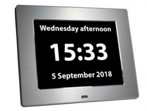 Reminder clock showing day, time, date and year