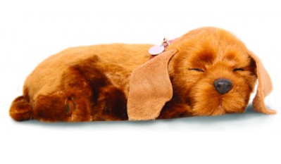 realistic toy dog that is asleep