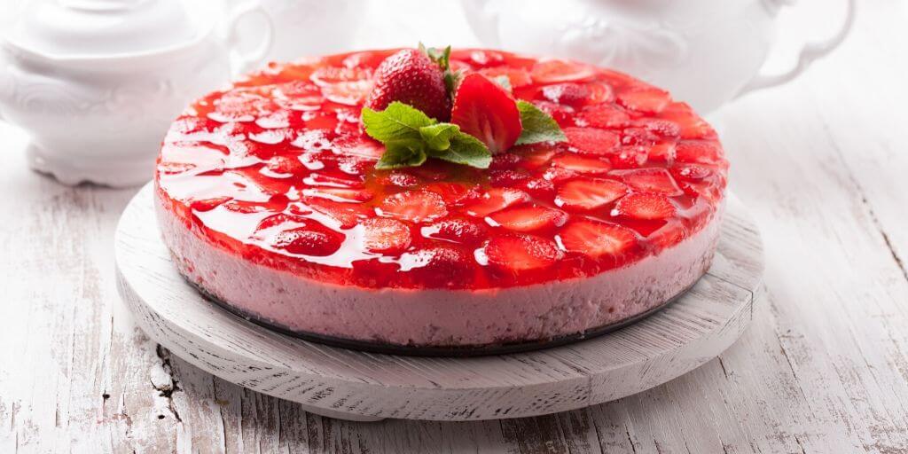 Summer Food Ideas And Recipes For Older Adults strawberry cheesecake with strawberries and mint on top